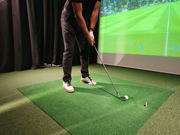 Indoor golf training session