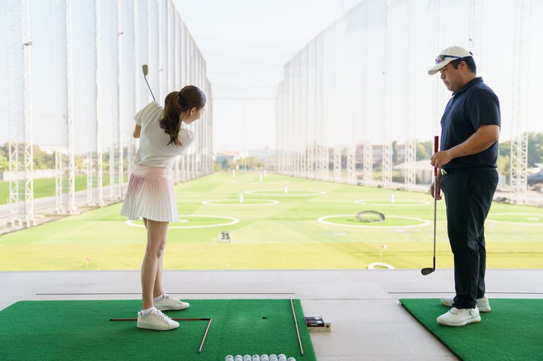 Female golfer with instructor